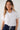 Magasinez la blouse courte à manches courtes de Colori - Shop the crop short sleeve blouse from Colori
