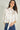 Magasinez la blouse courte en satin de Colori - Shop the short satin blouse from Colori