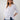 Magasinez la blouse rayée à manches trois-quarts de Colori - Shop the striped three-quarter sleeve blouse from Colori