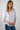 Magasinez la blouse rayée à manches trois-quarts de Colori - Shop the striped three-quarter sleeve blouse from Colori