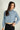 Magasinez la blouse courte à manches longues de Colori - Shop the short blouse with long sleeves from Colori