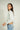 Magasinez la blouse courte à manches longues de Colori - Shop the short blouse with long sleeves from Colori
