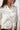 Magasinez la blouse imprimée avec noeud de Colori - Shop the printed tie-front blouse from Colori