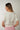 Magasinez le cardigan court avec boucles de Colori - Shop the short cardigan with bows from Colori