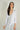 Magasinez le cardigan court à manches trois-quarts de Colori - Shop the short cardigan with three-quarter sleeves from Colori