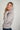 Magasinez le cardigan torsadé avec capuchon de Colori - Shop the cable knit hoodie cardigan from Colori
