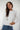 Magasinez le chandail hoodie avec pompons de Colori - Shop the hoodie with pom-poms from Colori