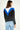 Magasinez le chandail bloc de couleurs à demi-fermeture éclair de Colori - Shop the color block half-zip sweater from Colori