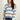 Magasinez le chandail rayé avec col en V de Colori - Shop the striped V-neck from Colori