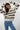 Magasinez le chandail rayé à col rond de Colori - Shop the striped crewneck sweater from Colori