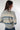 Magasinez le chandail rayé court à col montant de Colori - Shop the short striped turtleneck sweater from Colori