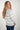 Magasinez le chandail rayé à col rond de Colori - Shop the striped crewneck sweater from Colori