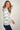 Magasinez le chandail rayé à col rond de Colori - Shop the striped crewneck sweater from Colori