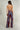 Magasinez la combinaison en mesh à dos ouvert de Colori - Shop the open-back mesh jumpsuit from Colori