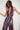 Magasinez la combinaison en mesh à dos ouvert de Colori - Shop the open-back mesh jumpsuit from Colori
