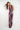 Magasinez la combinaison en mesh à dos ouvert de Colori - Shop the open-back mesh jumpsuit from Colori