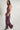Magasinez la combinaison en mesh à dos ouvert de Colori - Shop the open-back mesh jumpsuit from Colori