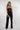 Magasinez la combinaison sans manches avec boutons de Colori - Shop the sleeveless jumpsuit with buttons from Colori