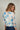 Magasinez le haut en filet fleuri à manches trois-quarts de Colori - Shop the floral mesh top with three-quarter sleeves from Colori