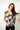 Magasinez le haut fleuri sans manches de Colori - Shop the sleeveless floral top from Colori