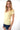 Magasinez le haut côtelé à col en V de Colori - Shop the ribbed V-neck top from Colori
