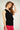 haut-noir-sans-manches-a-col-cravate-Colori-sleeveless-tie-neck-black-top-Colori-