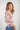 Magasinez le haut en filet fleuri à manches trois-quarts de Colori - Shop the floral mesh top with three-quarter sleeves from Colori