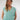 Magasinez le haut cache-coeur sans manches de Colori - Shop the sleeveless wrap top from Colori