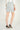 Magasinez la jupe courte à texture bouclée de Colori - Shop the short skirt with bouclé texture from Colori