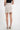 Magasinez la jupe courte portefeuille de Colori - Shop the short wrap skirt from Colori