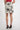 Magasinez la jupe courte imprimée de Colori - Shop the short printed skirt from Colori