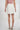 Magasinez la jupe courte portefeuille de Colori - Shop the short wrap skirt from Colori