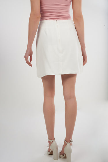 Magasinez la jupe courte portefeuille de Colori - Shop the short wrap skirt from Colori