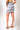 Magasinez la jupe courte à motif zigzag de Colori - Shop the mini skirt with zigzag print from Colori