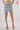 Magasinez la jupe courte à motif zigzag de Colori - Shop the mini skirt with zigzag print from Colori