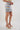 Magasinez la jupe courte à motif zigzag de Colori - Shop the mini skirt with zigzag print from Colori