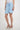 Magasinez la jupe courte portefeuille de Colori - Shop the short wrap skirt from Colori