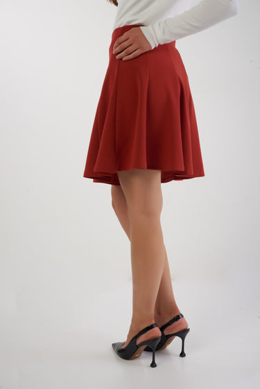 Magasinez la jupe courte plissée de Colori - Shop the mini pleated skirt from Colori