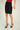 Magasinez la jupe crayon brillante de Colori - Shop the shiny pencil skirt from Colori