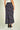 Magasinez la jupe midi en satin de Colori - Shop the satin midi skirt from Colori