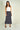 Magasinez la jupe midi en satin de Colori - Shop the satin midi skirt from Colori