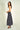 Magasinez la jupe midi en satin de Colori - Shop the satin midi skirt from Colori