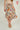 Magasinez la jupe midi fleurie à volants de Colori - Shop the floral ruffle midi skirt from Colori