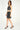 Magasinez la jupe courte en faux cuir de Colori - Shop the faux leather short skirt from Colori