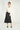 Magasinez la jupe midi en satin de Colori - Shop the satin midi skirt from Colori