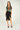Magasinez la jupe portefeuille mi-longue de Colori - Shop the mid-length wrap skirt from Colori