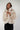 Magasinez le manteau court en fourrure de Colori - Shop the short fur coat from Colori