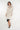 Magasinez le manteau long à détail de fourrure de Colori - Shop the long coat with fur detail from Colori