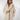 Magasinez le manteau long en fourrure de Colori - Shop the long fur coat from Colori