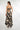 Magasinez la robe à dos ouvert avec volants de Colori - Shop the open-back dress with ruffles from Colori